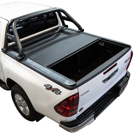 TAPA RETRÁCTIL KRAKEN TOYOTA HILUX 2023+ C/BARRA PLÁSTICA