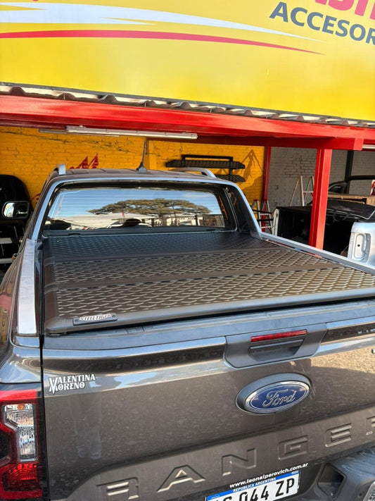 Tapa rígida plegable instalada en Ford Ranger (foto de referencia)